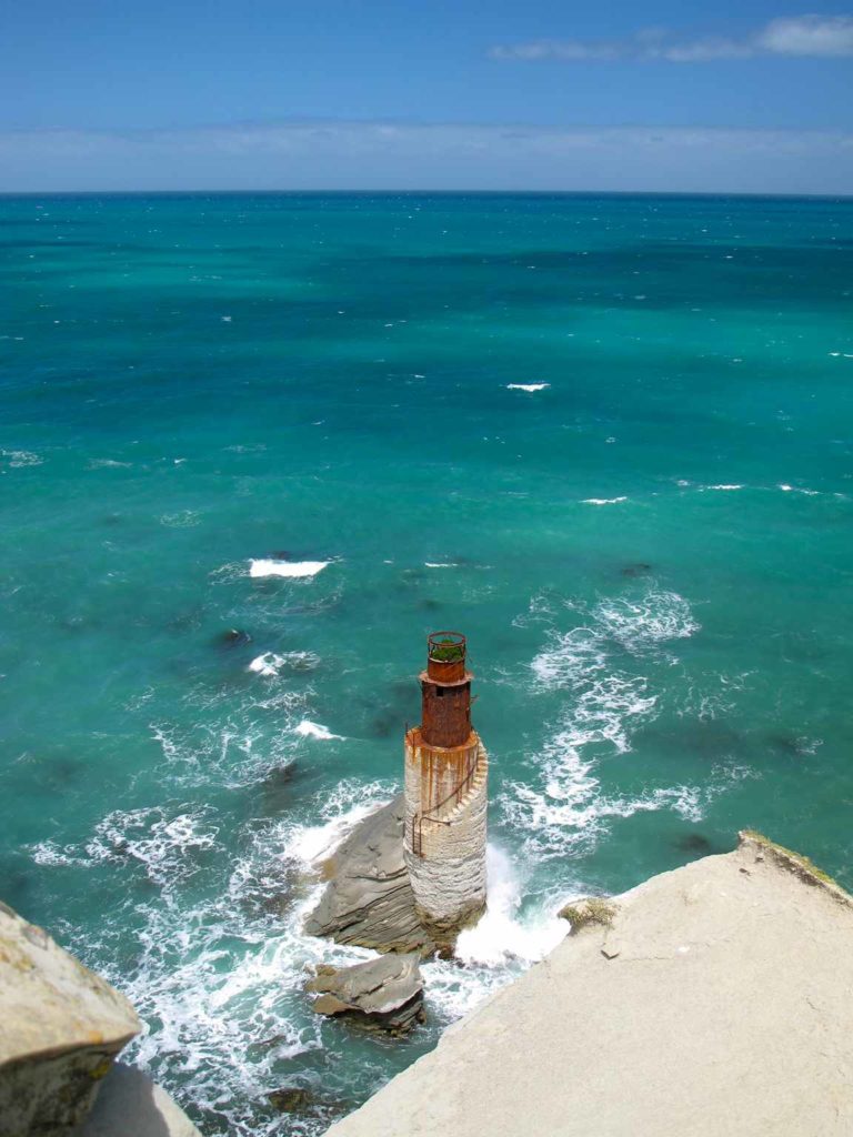 Tuahine lighthouse seen from the ridge. Contemporary reports state that there was never an outer handrail on that staircase, and the inner one barely had finger spacing between it and the tower wall. Photo: NZFrenzy Tuahine lighthouse seen from the ridge. Contemporary reports state that there was never an outer handrail on that staircase, and the inner one barely had finger spacing between it and the tower wall. Photo: NZFrenzy