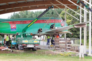 Wings being unbolted ready for restoration, 2012.  Photo: Ben Curran/Waikato Times
