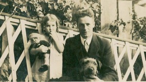 Elsie Glasgow with her dog Dash, and father John, circa 1927. 