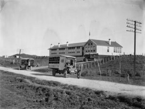 All three original buses departing Piopio School, 1920's.