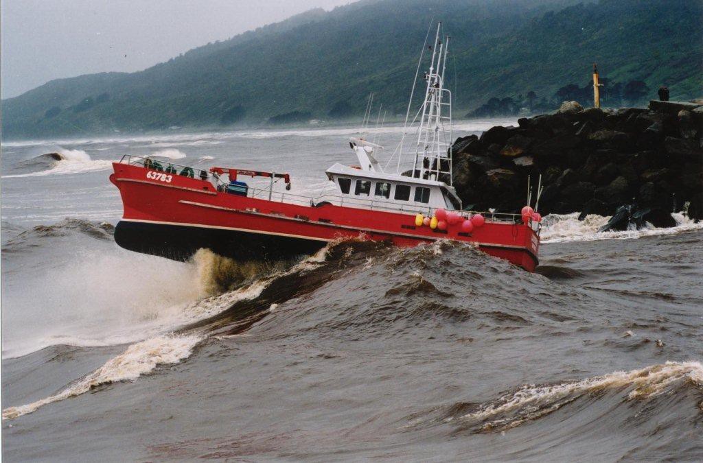 Fishing boat crossing the bar at the Grey River entrance. Photo: McBride Design