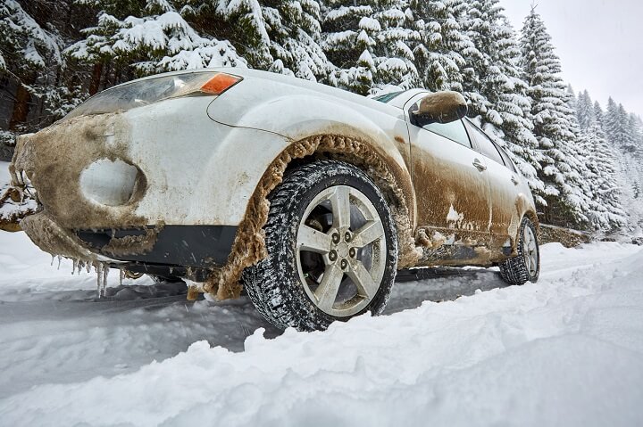 SUV On Icy Mountain Road